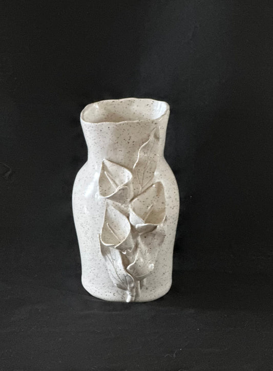 Speckled White Vase With Calla Lilies