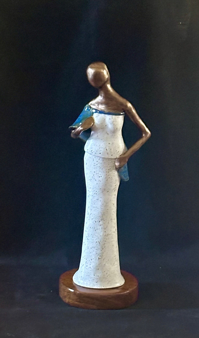 Hand-sculpted ceramic figurative sculpture 15.5 inches tall by Arlette Delcham — Helping Hands Gallery


