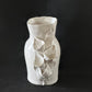Speckled White Vase With Calla Lilies